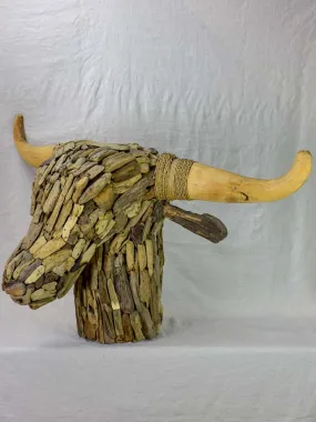 Life-size bull's head made from driftwood